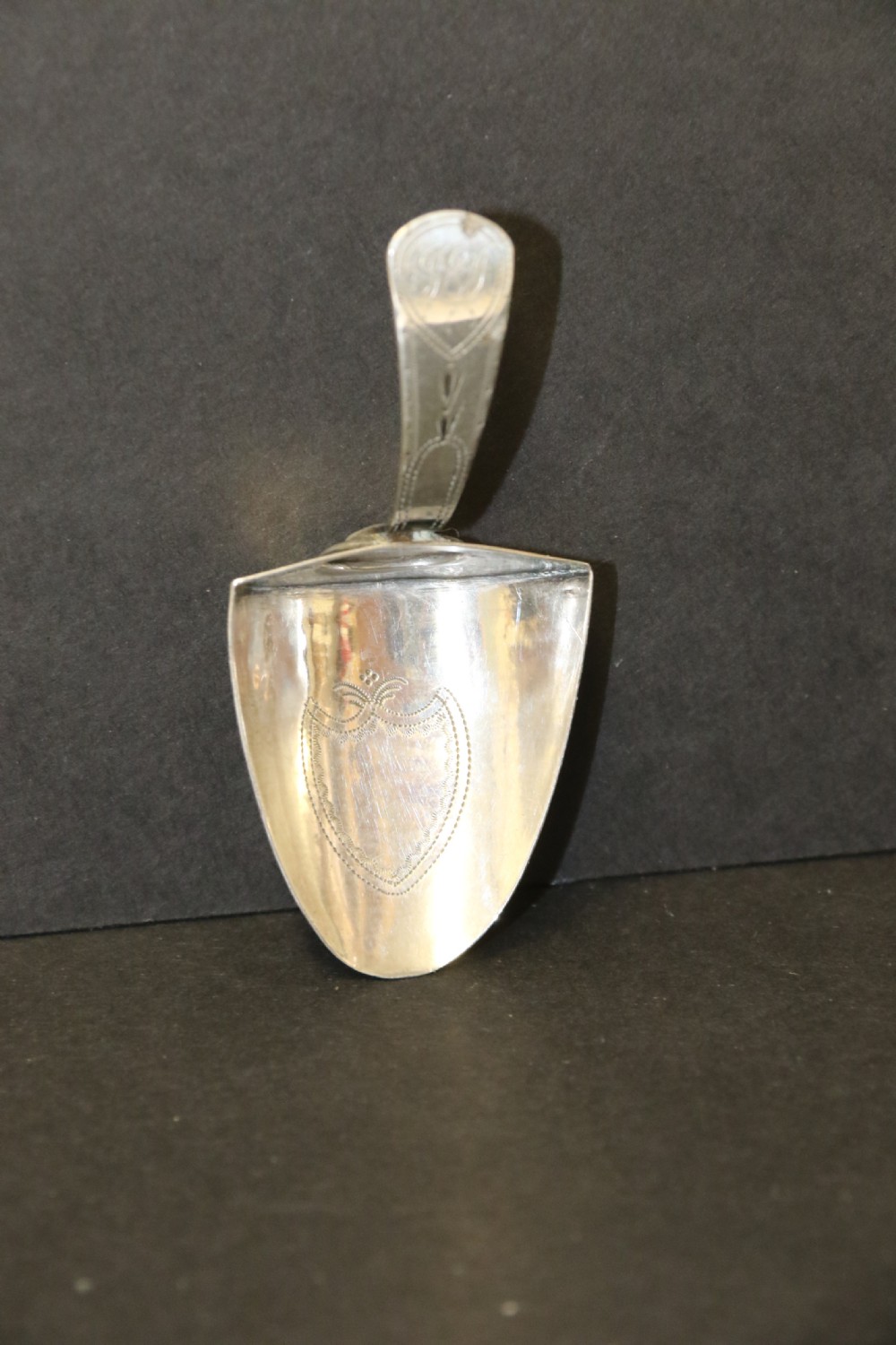 An antique silver George III Tea Caddy Spoon View VII