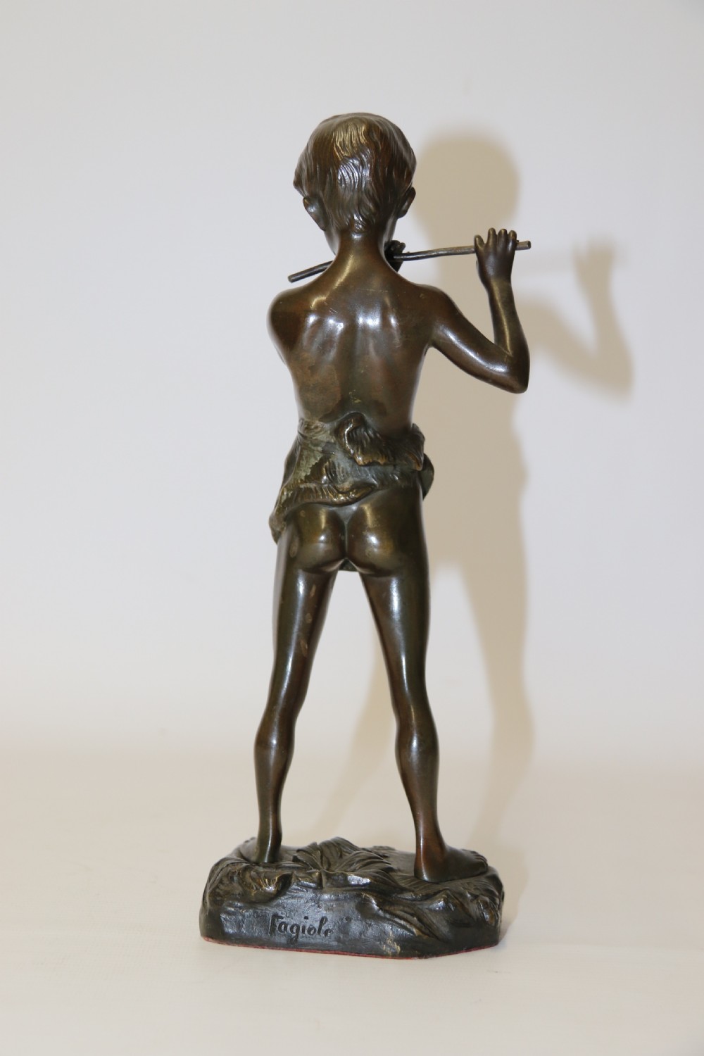 A Fine Bronze Study of a Boy Playing a Flute by Attiwo Fagioli View III