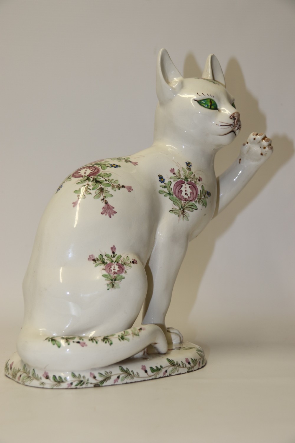 A large French early 20th C hand painted faience Pottery Cat. View II