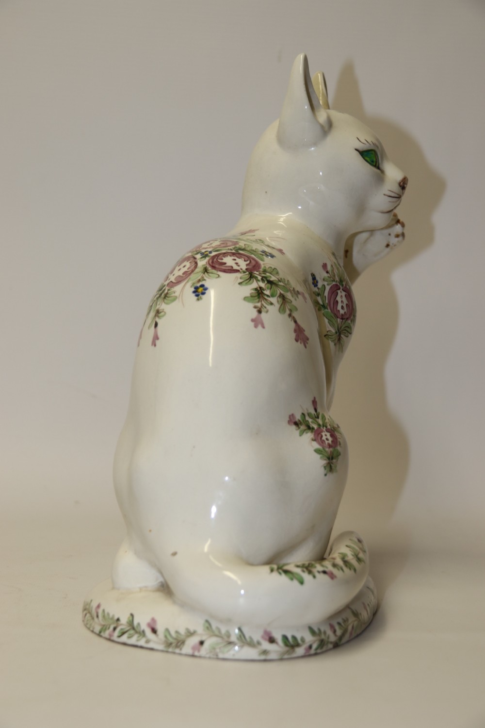 A large French early 20th C hand painted faience Pottery Cat. View III
