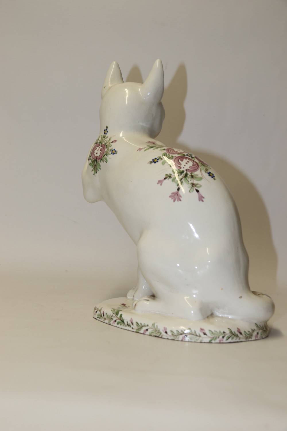 A large French early 20th C hand painted faience Pottery Cat. View IV