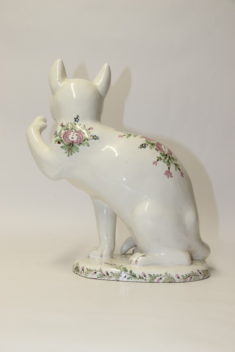 A large French early 20th C hand painted faience Pottery Cat. View V