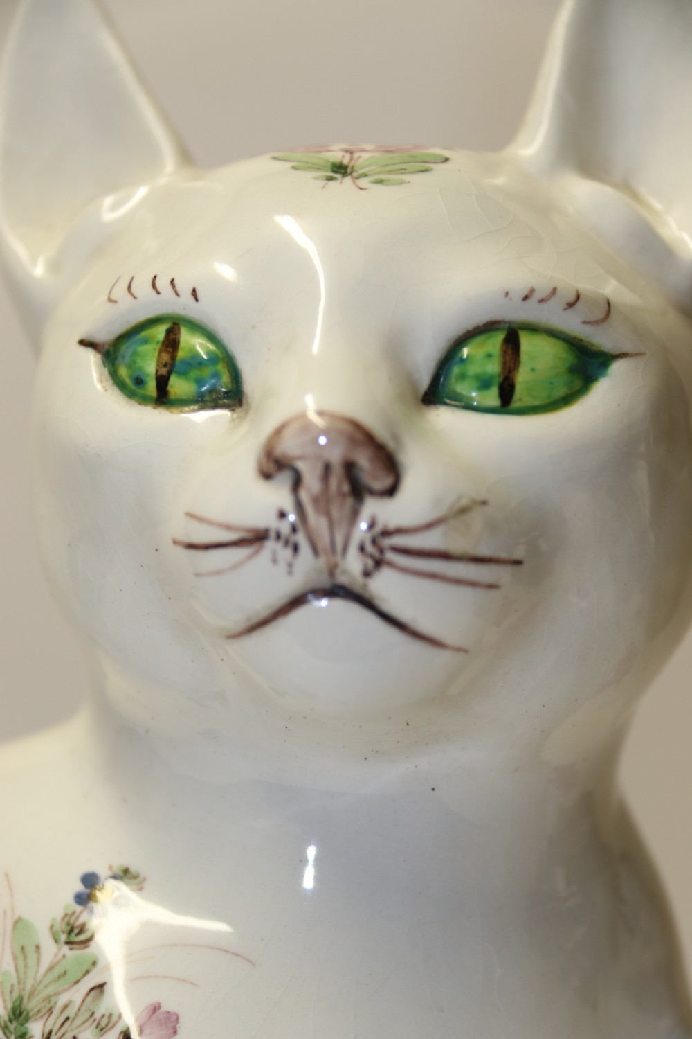 A large French early 20th C hand painted faience Pottery Cat. View VIII