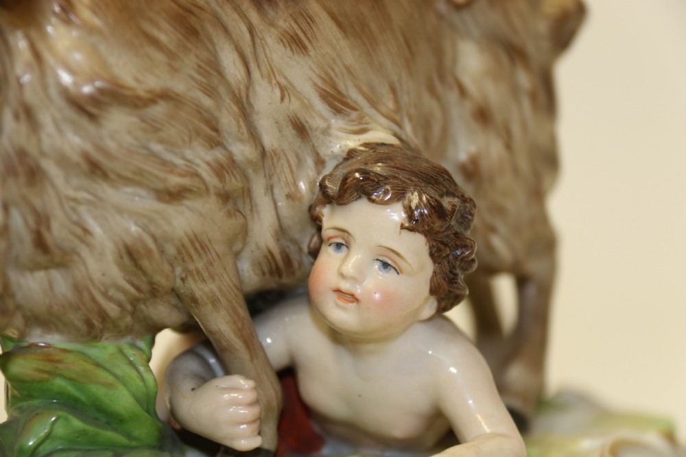 A fine Porcelain Figure Group of three Putti Wrestling with a Goat by Hochst Factory View VII