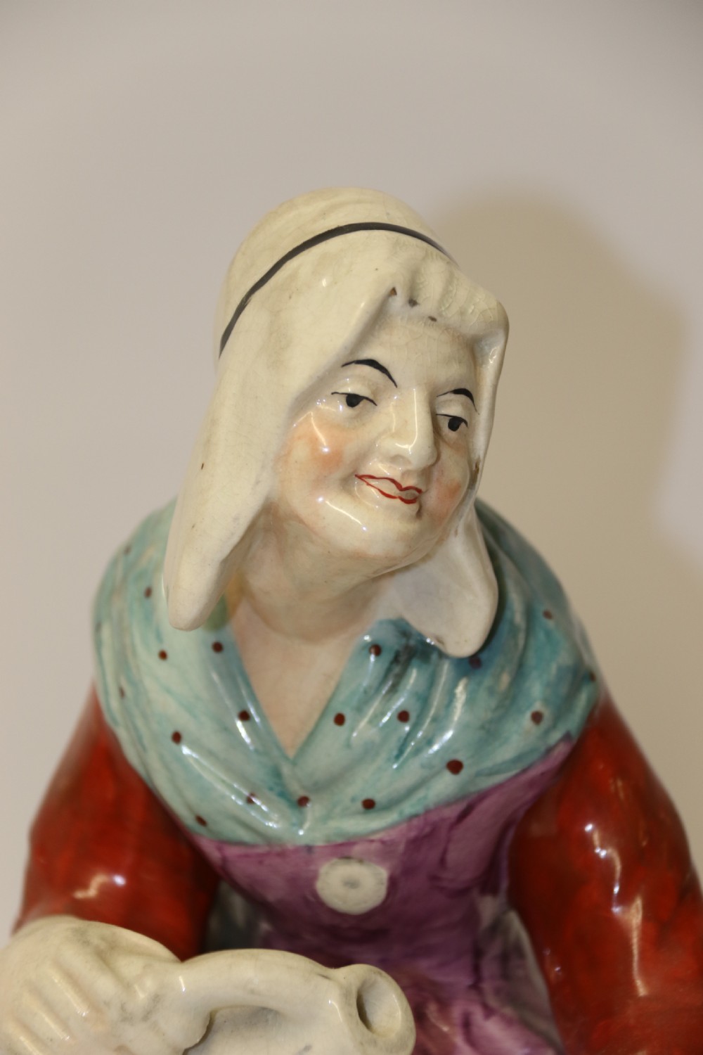 A large pair of  19th C Staffordshire Pottery Seated figures. View VI
