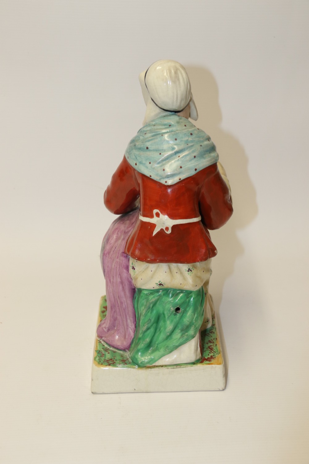 A large pair of  19th C Staffordshire Pottery Seated figures. View XIII