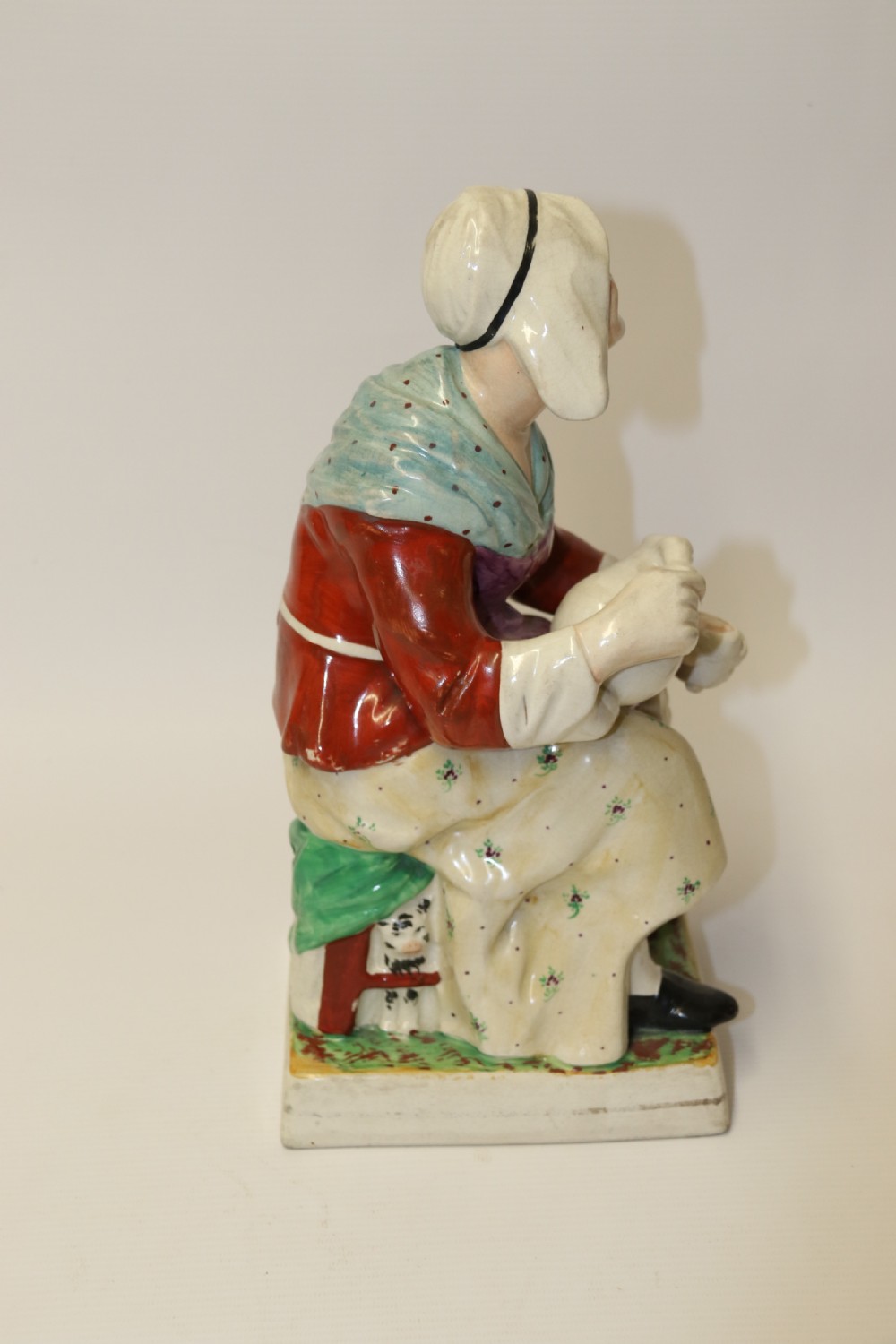 A large pair of  19th C Staffordshire Pottery Seated figures. View XIV