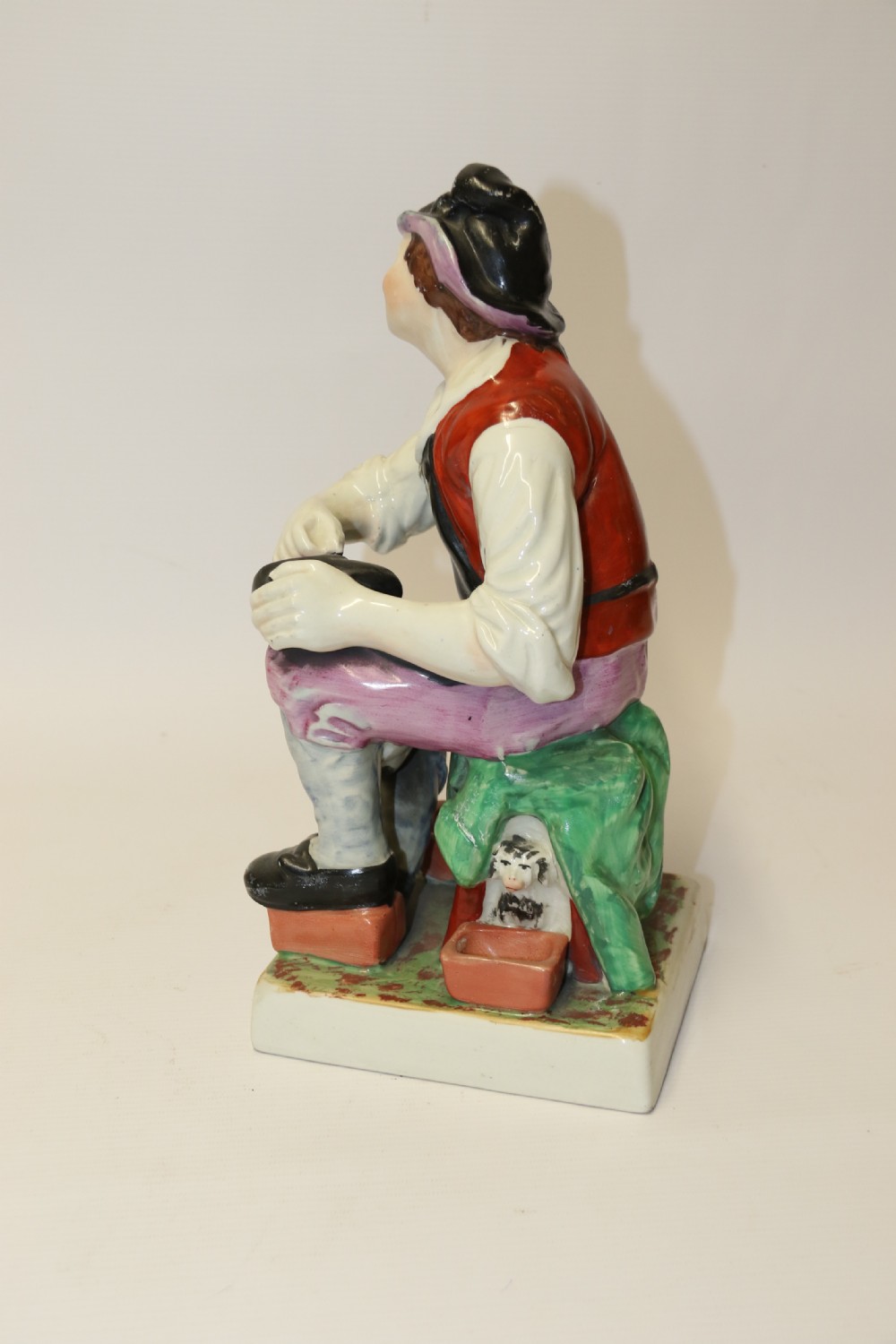 A large pair of  19th C Staffordshire Pottery Seated figures. View XIX