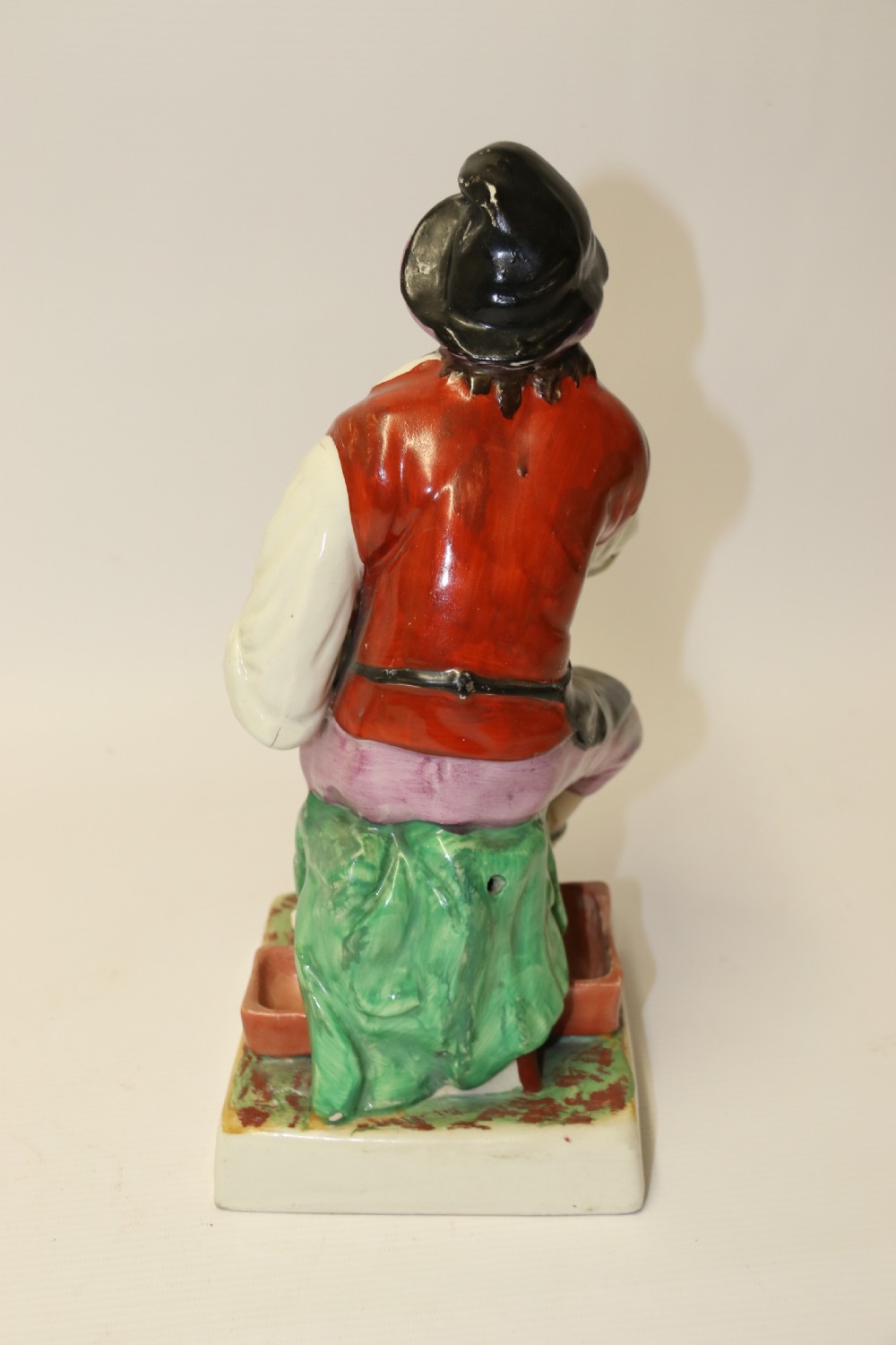 A large pair of  19th C Staffordshire Pottery Seated figures. View XX