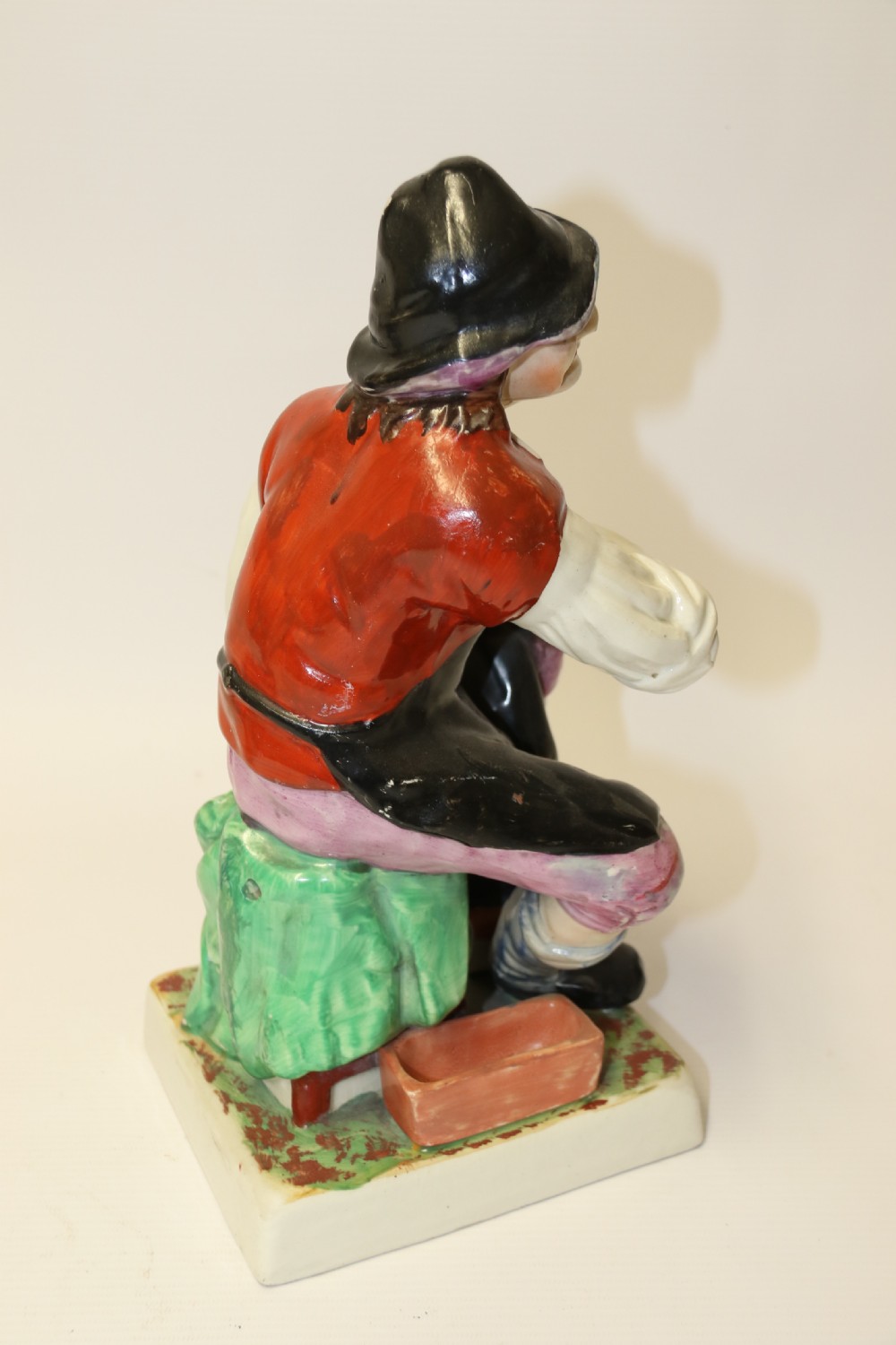 A large pair of  19th C Staffordshire Pottery Seated figures. View XXI