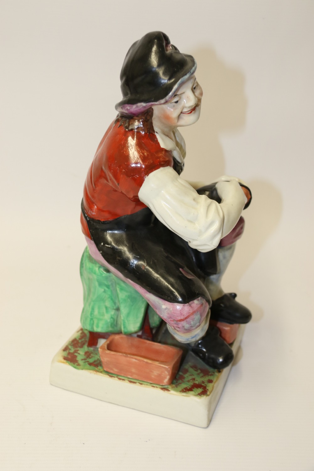 A large pair of  19th C Staffordshire Pottery Seated figures. View XXII