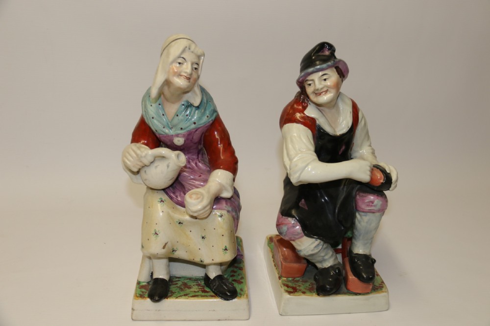 A large pair of  19th C Staffordshire Pottery Seated figures. View XXVI