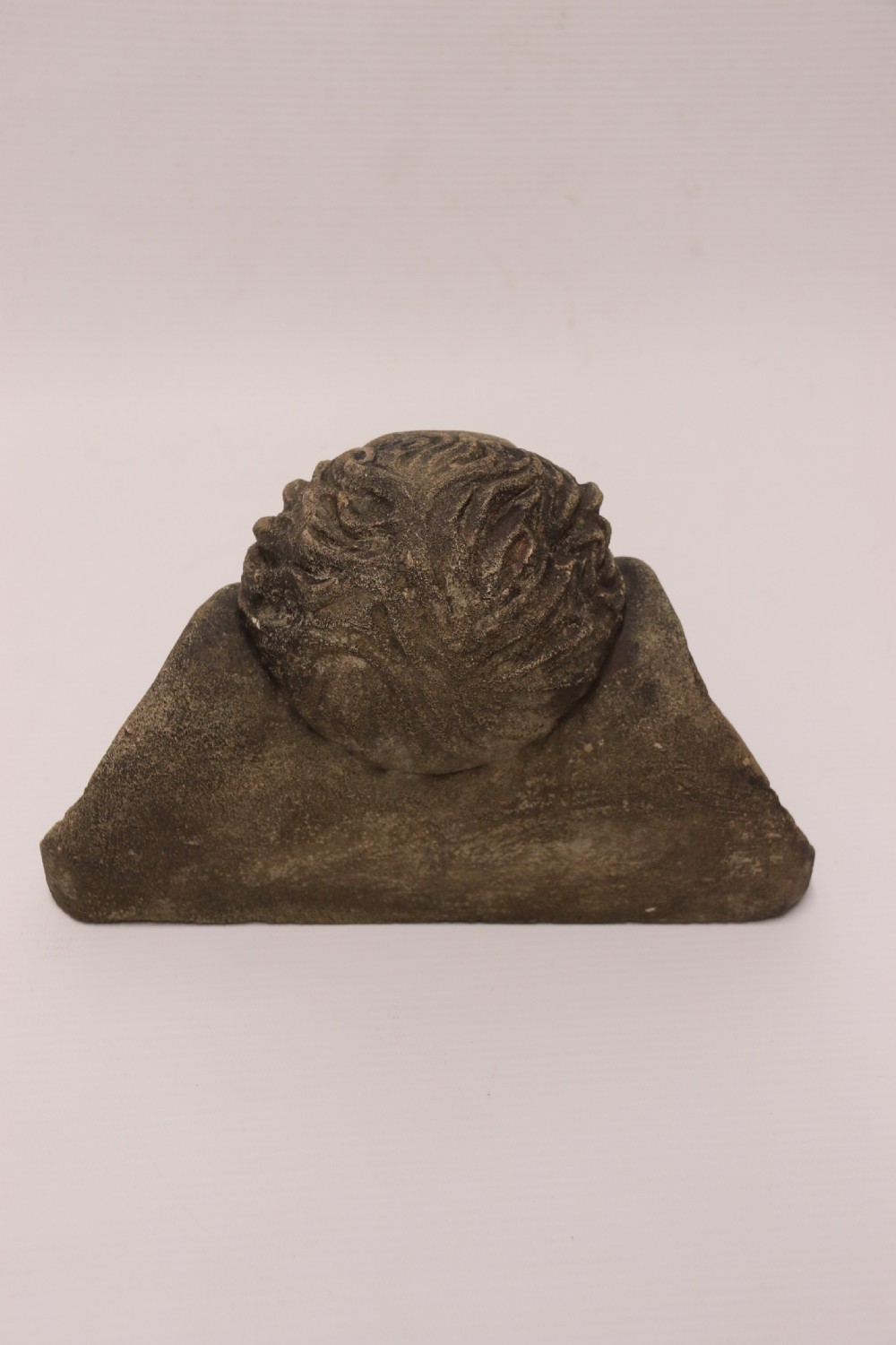 A hand carved Portland Stone Wall Cherub, signed M. R Bland,1874 View III