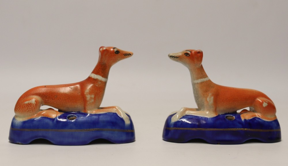 A pair of English Staffordshire Pottery Grey Hound Dogs. Mid 19th C