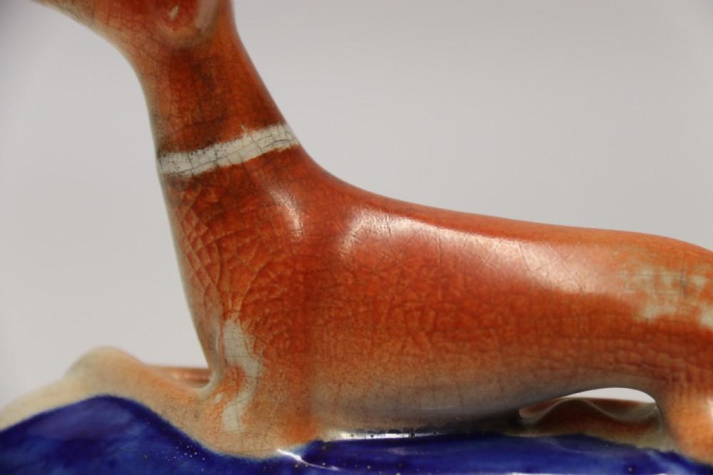 A pair of English Staffordshire Pottery Grey Hound Dogs. Mid 19th C View IX