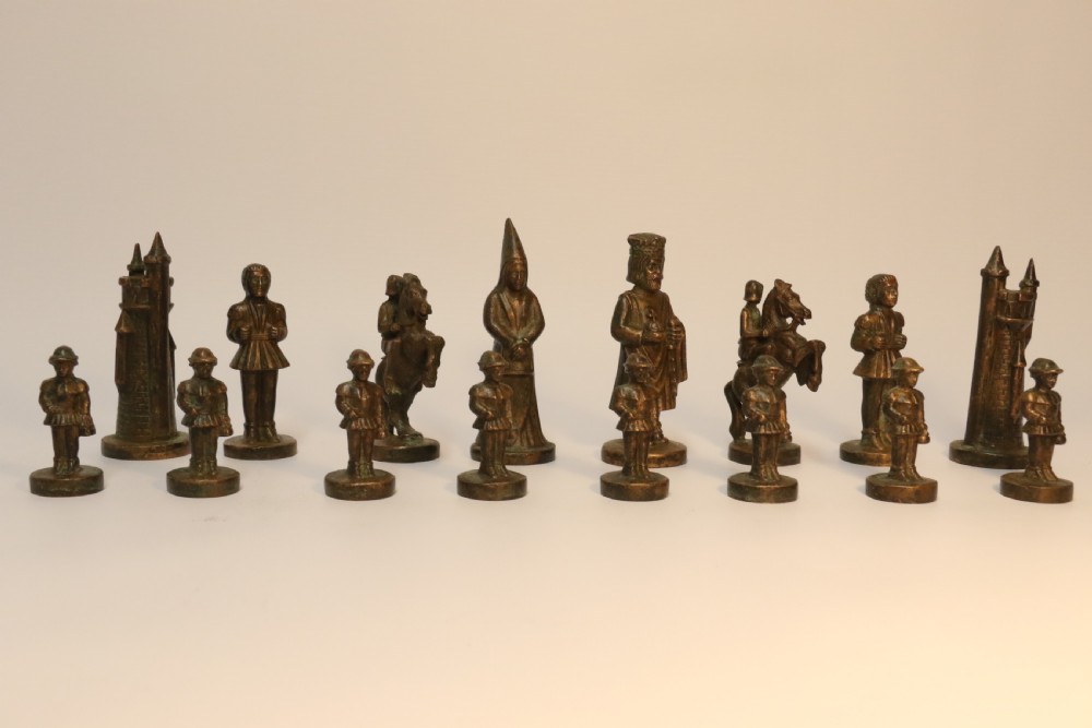 An Unusual Bronze and Nickel Chess Set View XI