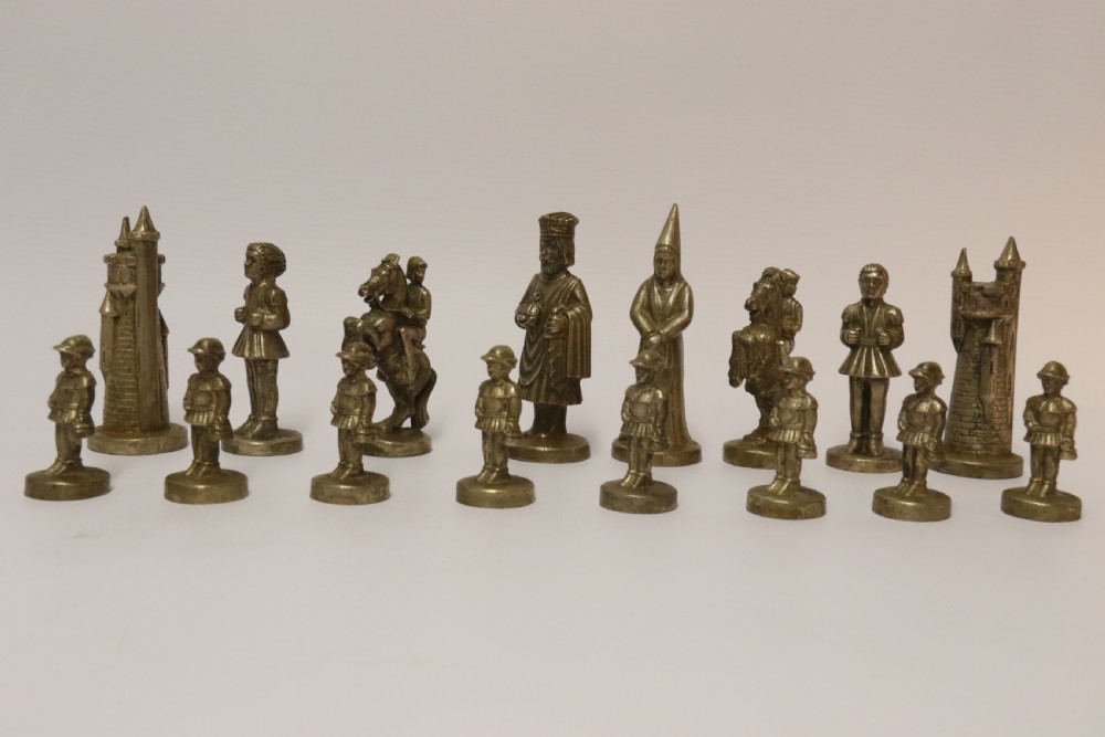 An Unusual Bronze and Nickel Chess Set View XVI