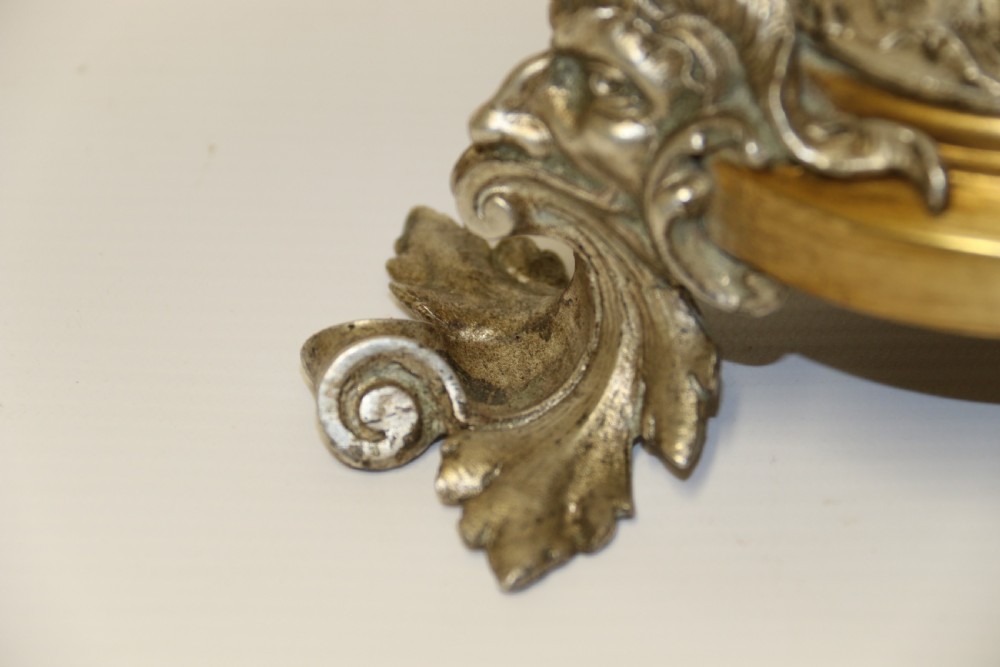 A fine silver and gilt bronze table centre piece in the form of a gondola  View VII