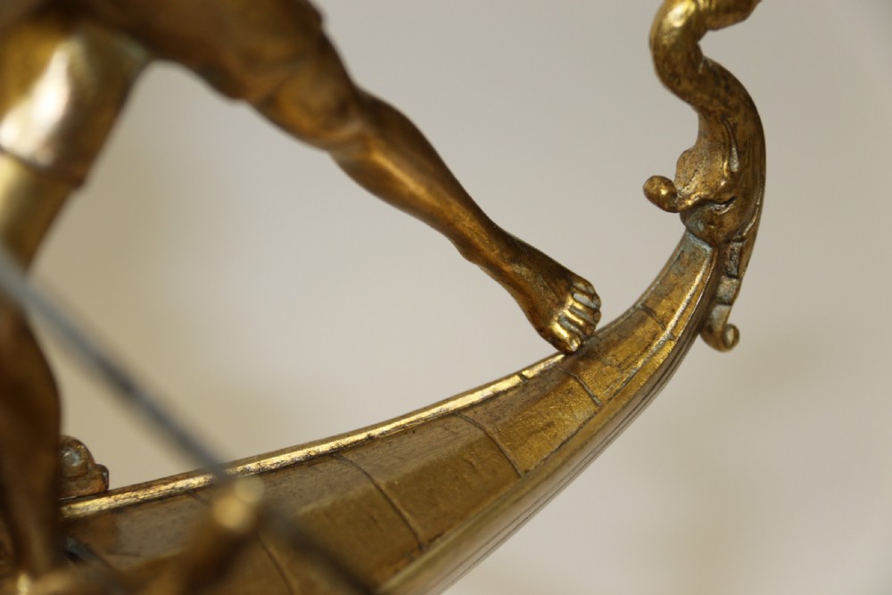 A fine silver and gilt bronze table centre piece in the form of a gondola  View XI