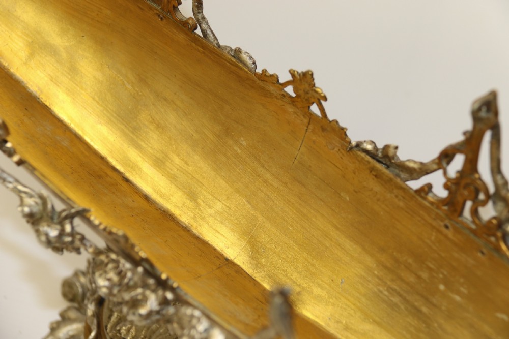 A fine silver and gilt bronze table centre piece in the form of a gondola  View XII