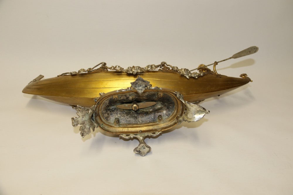 A fine silver and gilt bronze table centre piece in the form of a gondola  View XIII