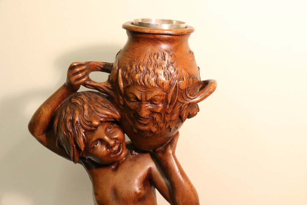 Antique 19 C Carved study of Semi nude Mythical Boy standing on a fluted pedestal   View III