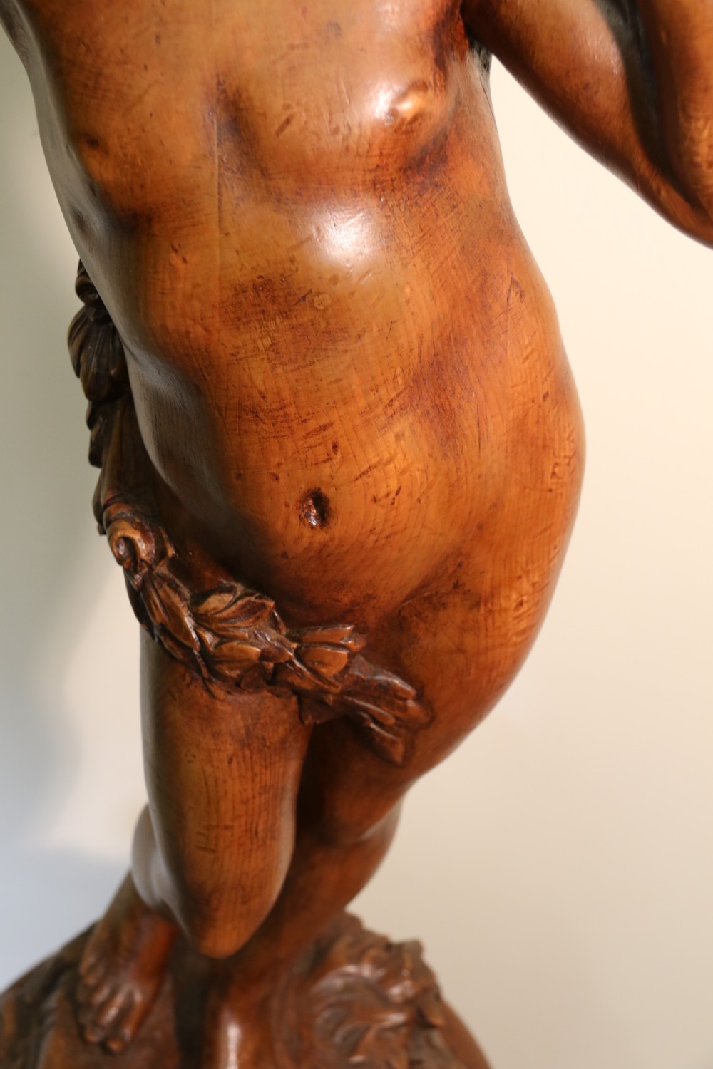 Antique 19 C Carved study of Semi nude Mythical Boy standing on a fluted pedestal   View IV