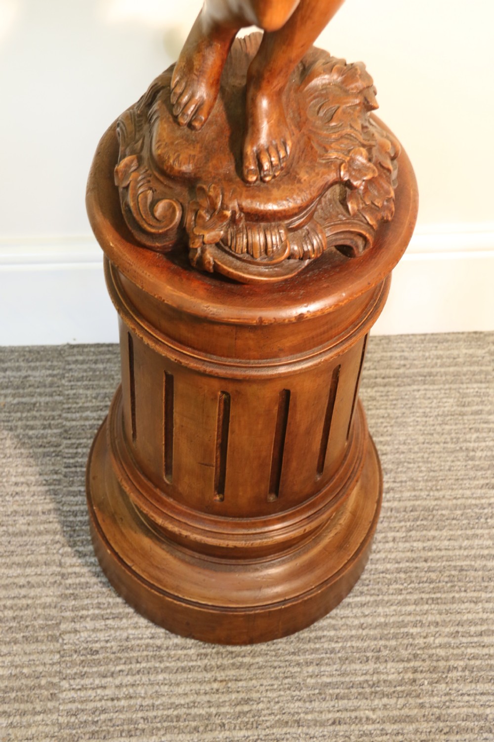 Antique 19 C Carved study of Semi nude Mythical Boy standing on a fluted pedestal   View VI