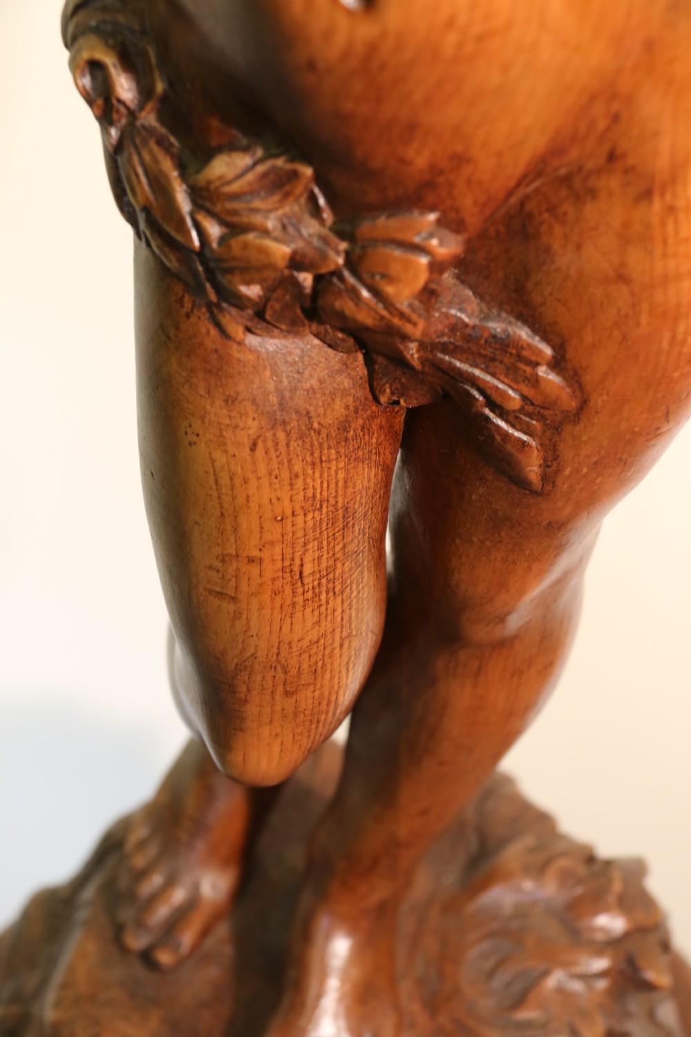 Antique 19 C Carved study of Semi nude Mythical Boy standing on a fluted pedestal   View VII