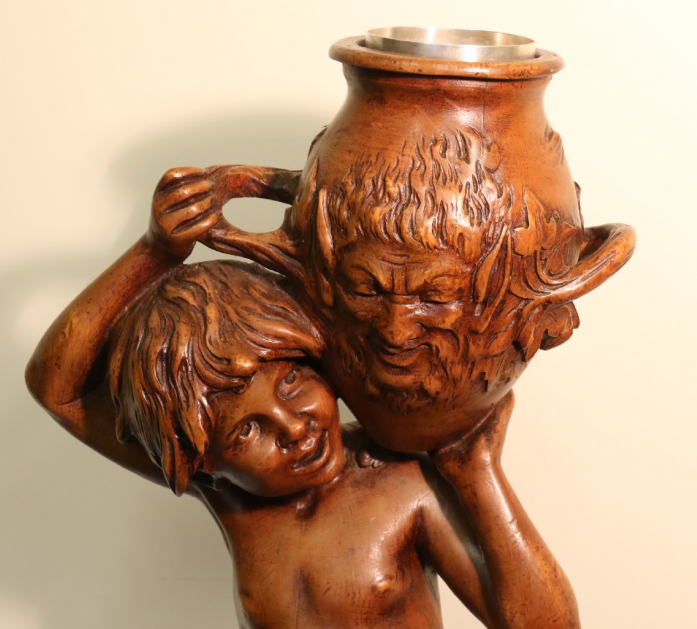 Antique 19 C Carved study of Semi nude Mythical Boy standing on a fluted pedestal   View XVI