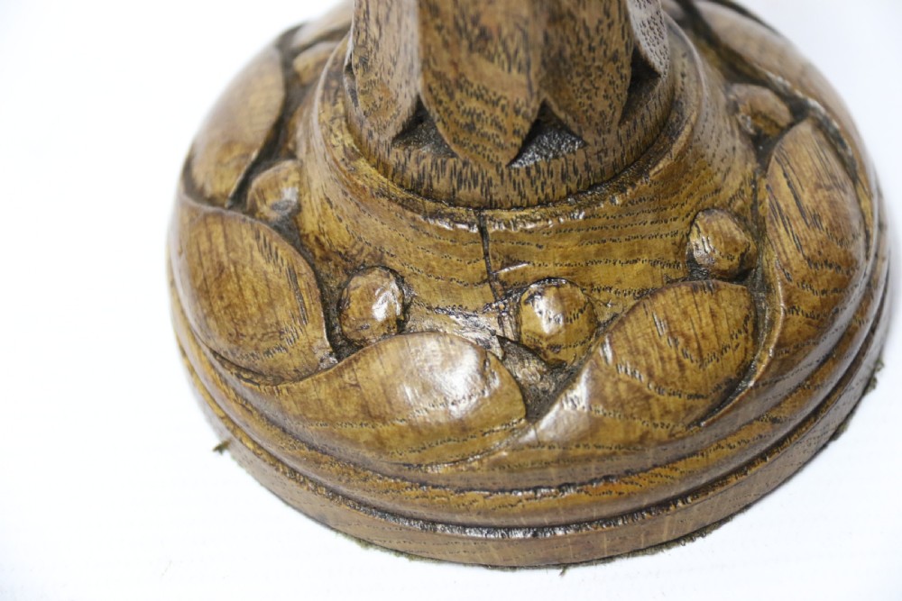 A fine pair of English Victorian Carved Oak Gothic Revival Candlesticks. View IV