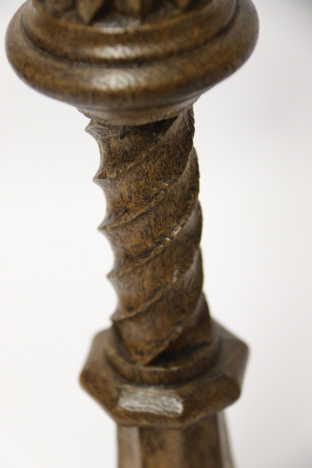 A fine pair of English Victorian Carved Oak Gothic Revival Candlesticks. View VI