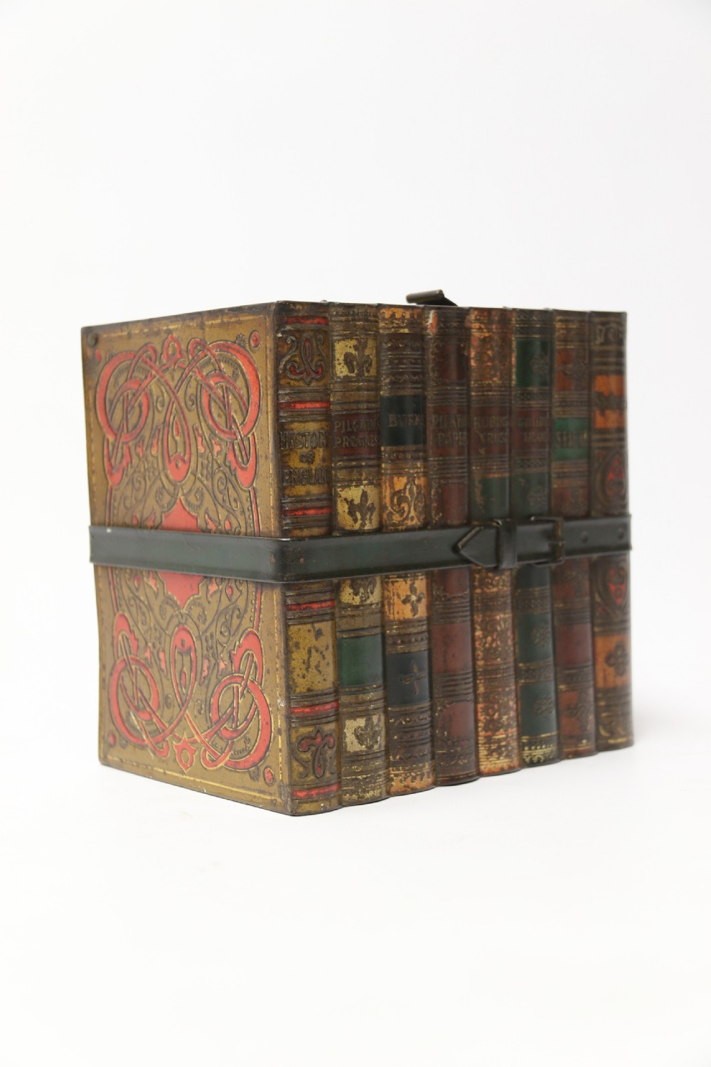 A Victorian Huntley and Palmer Biscuit Tin in the form of a Group of Books