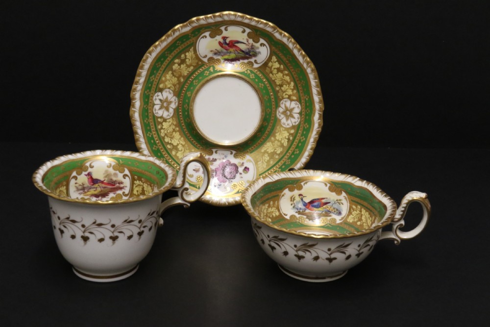 A superb early 19th c English H. R Daniel Porcelain Cabinet Trio