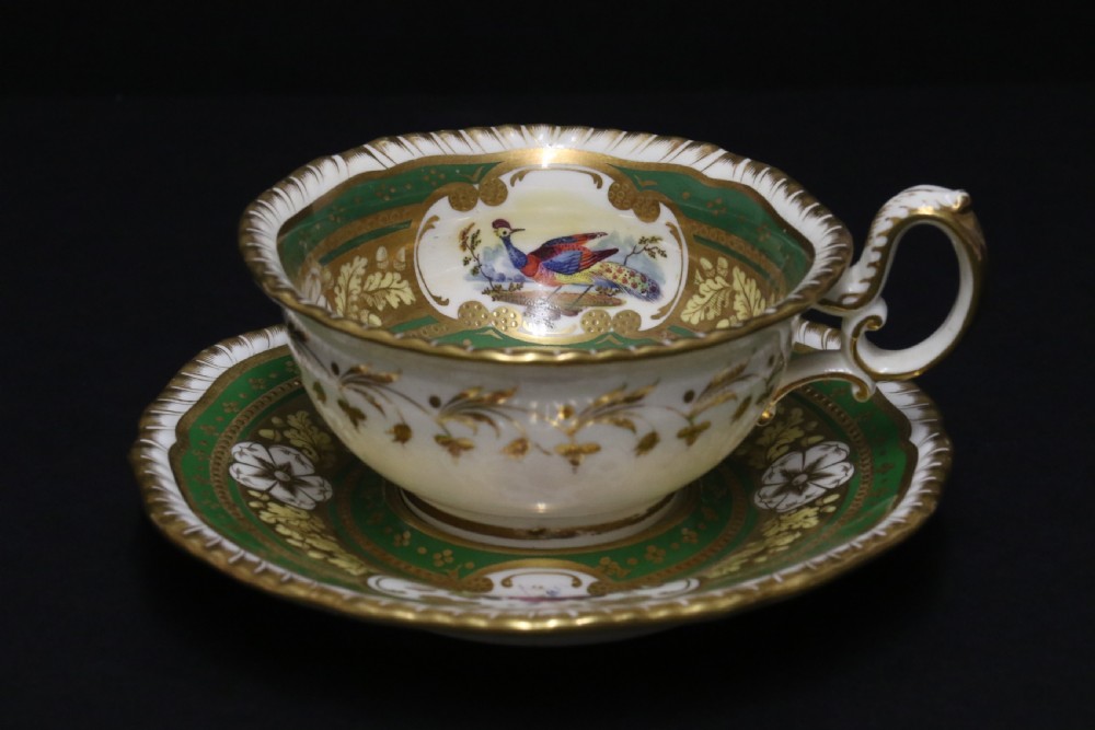 A superb early 19th c English H. R Daniel Porcelain Cabinet Trio View II
