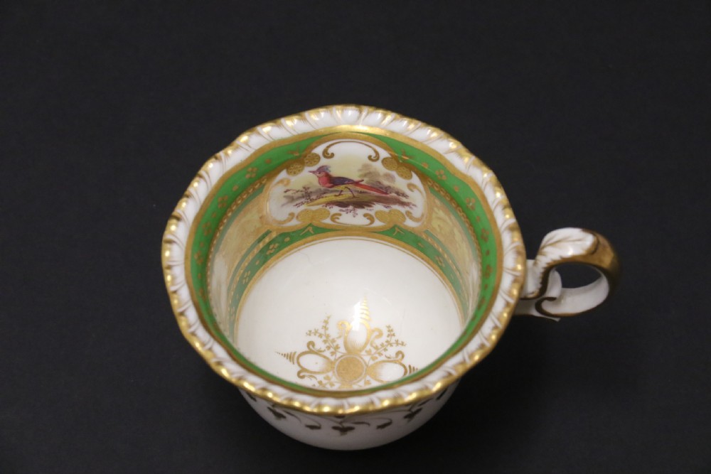 A superb early 19th c English H. R Daniel Porcelain Cabinet Trio View XV