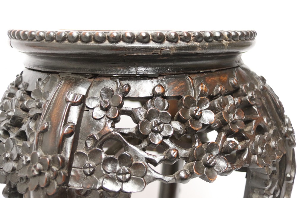 A Chinese late 19th century carved hardwood circular table or stand View V