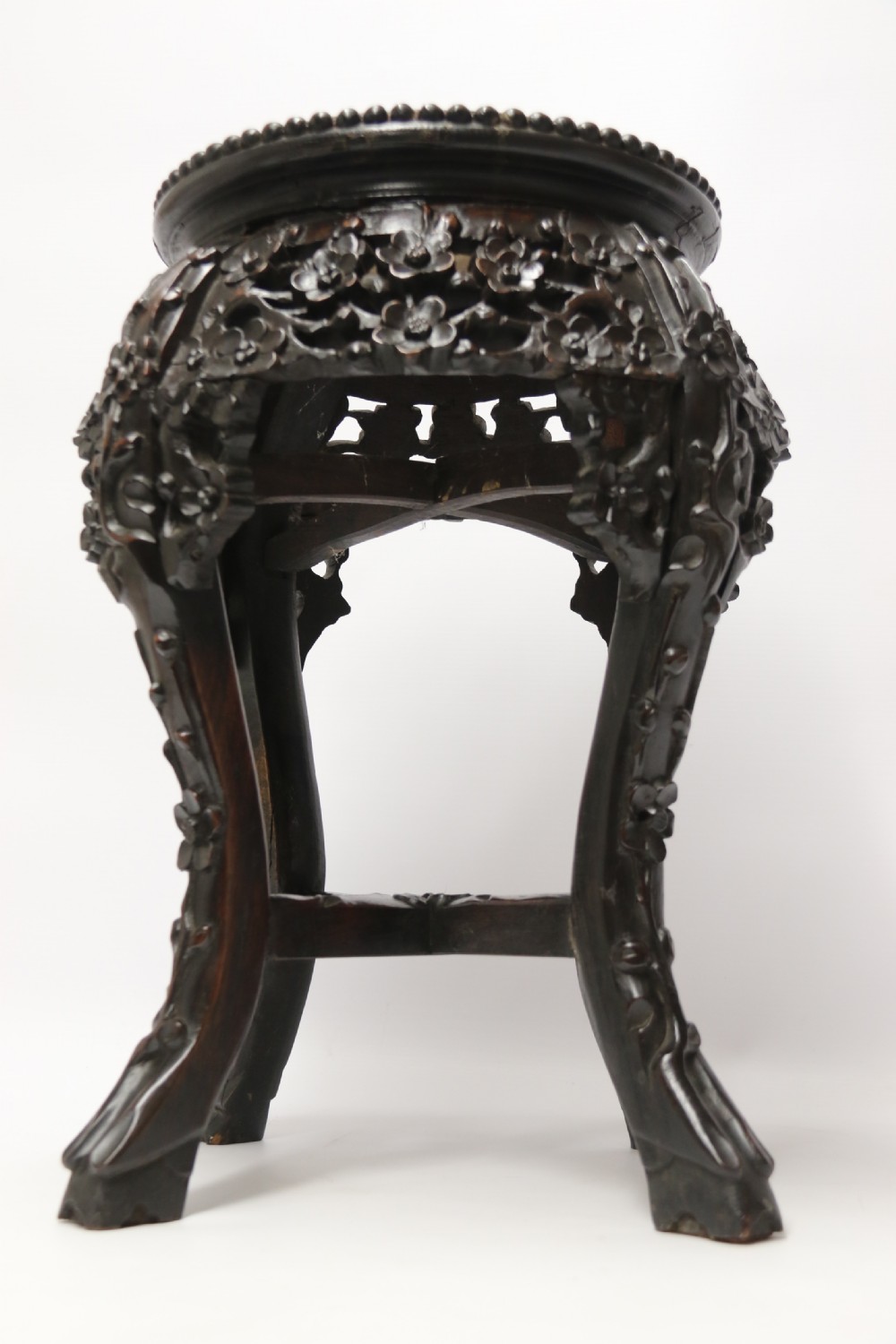 A Chinese late 19th century carved hardwood circular table or stand View VIII