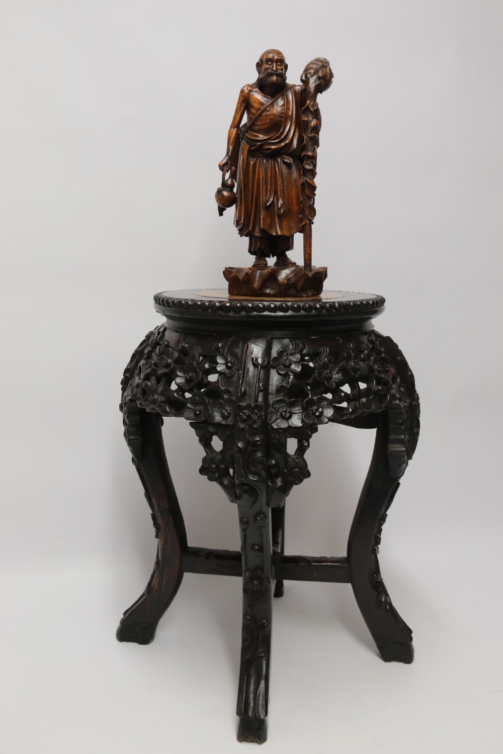 A Chinese late 19th century carved hardwood circular table or stand View XI