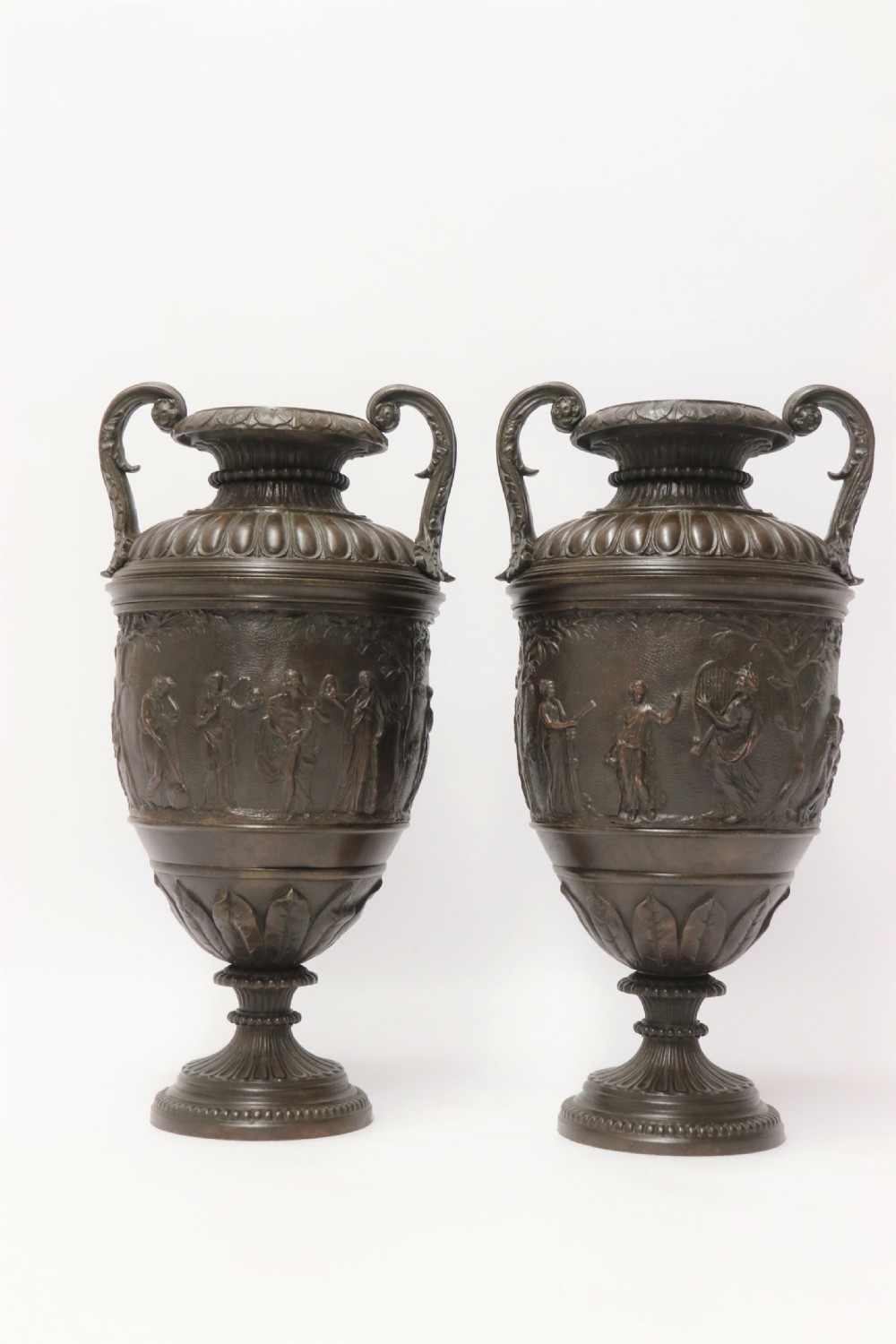 A fine pair of Grand Tour French 19th C Neoclassical Bronze Urns