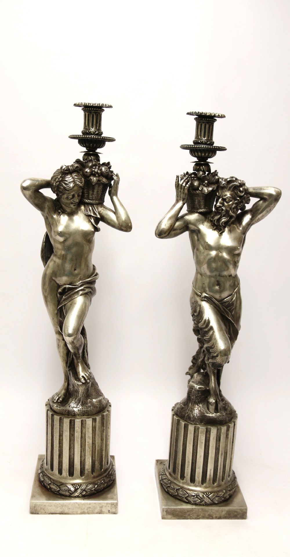 A Large pair of  19th c silvered bronze classical figurative candlesticks