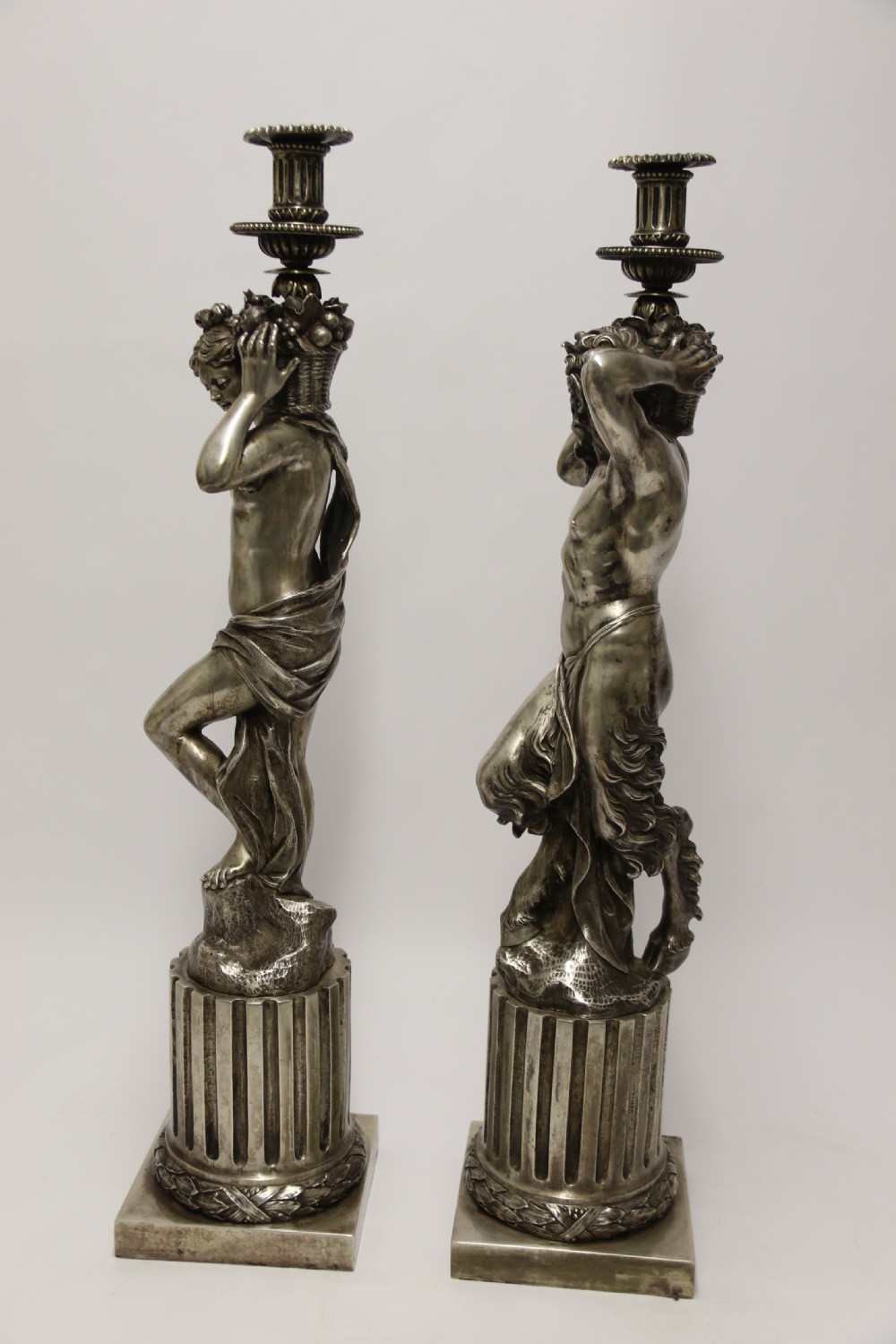A Large pair of  19th c silvered bronze classical figurative candlesticks View III
