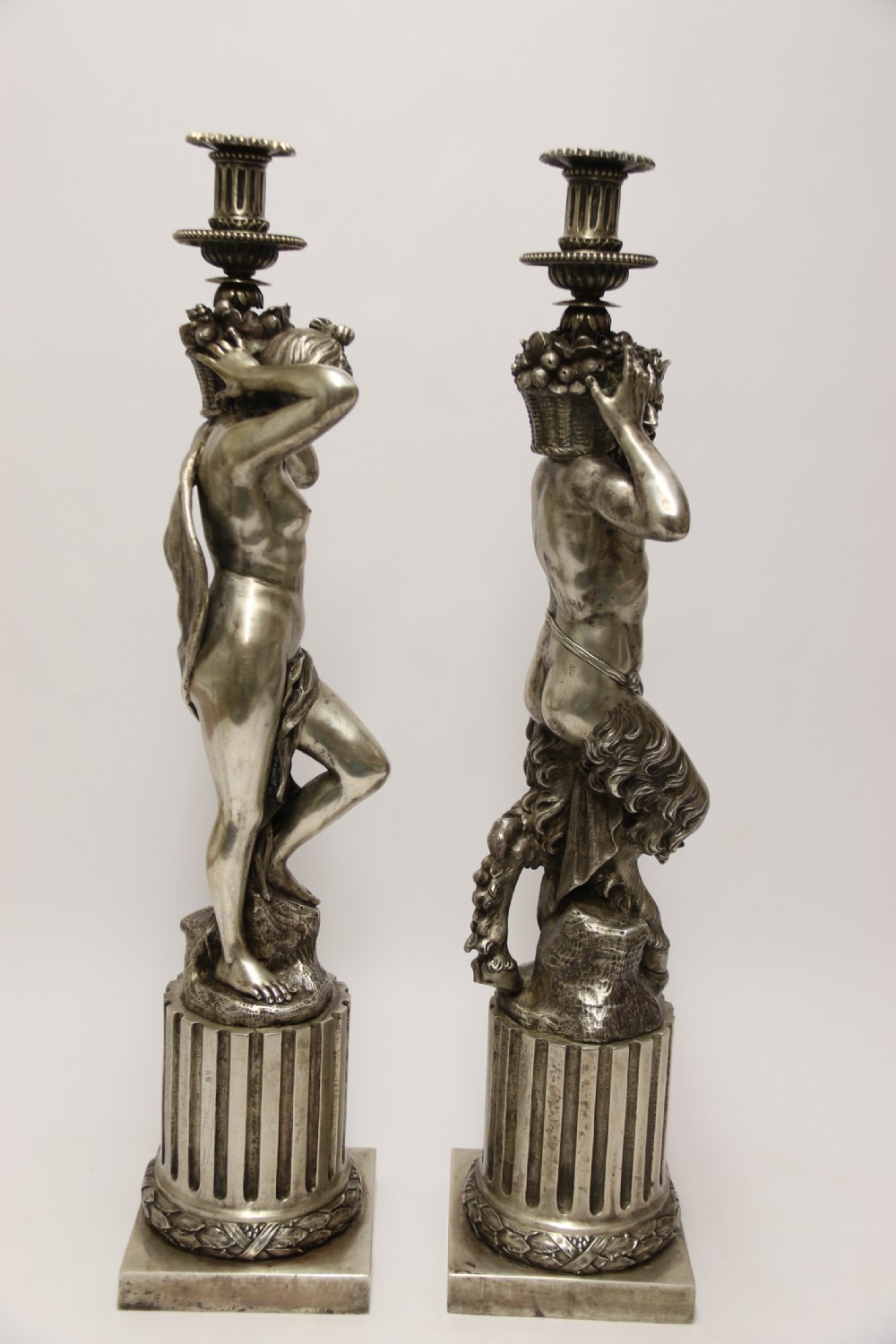 A Large pair of  19th c silvered bronze classical figurative candlesticks View IV