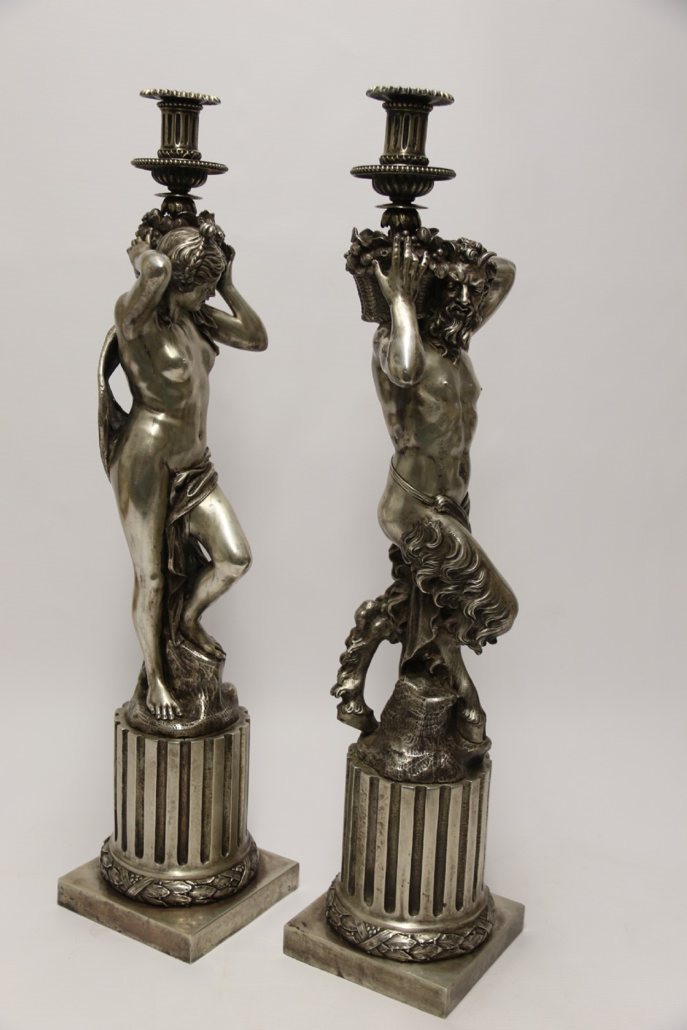 A Large pair of  19th c silvered bronze classical figurative candlesticks View V