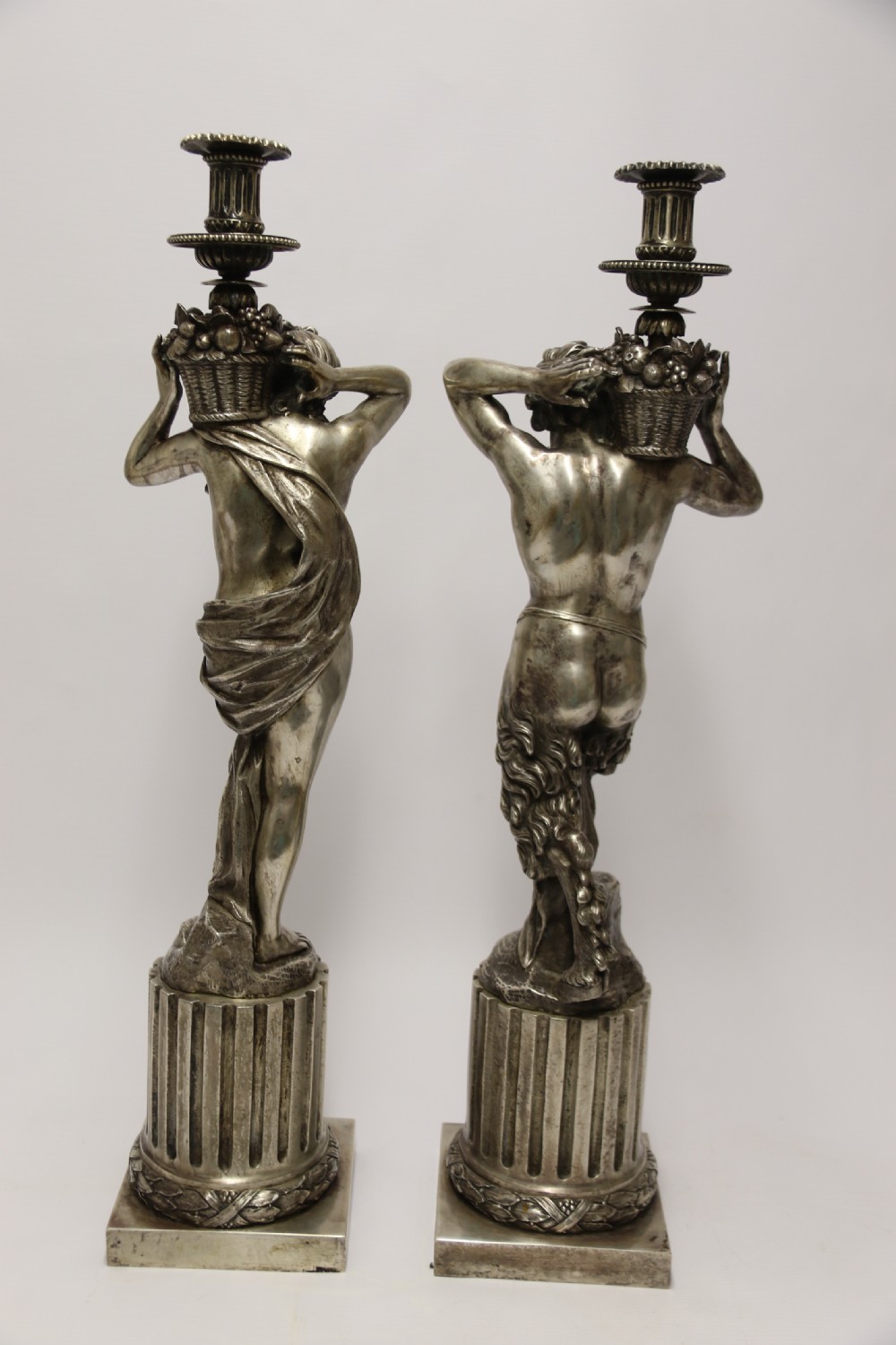 A Large pair of  19th c silvered bronze classical figurative candlesticks View VII