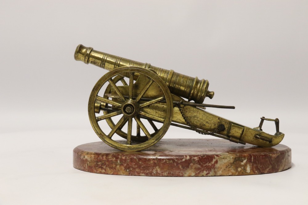 A superb mid-19th century French bronze model canon. View XVIII