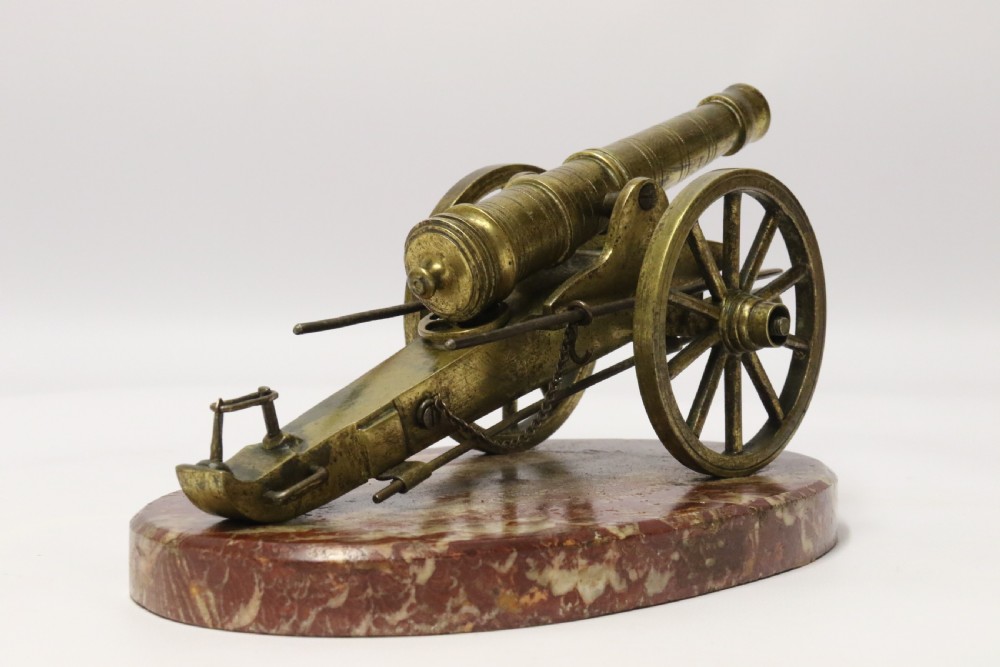 A superb mid-19th century French bronze model canon. View XXI
