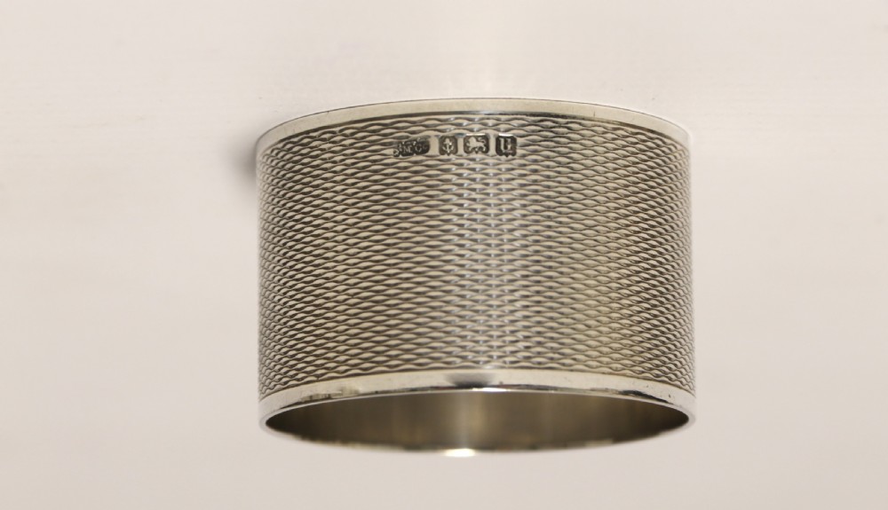 A boxed set of six Silver Napkin Rings, 1919 - 1920 View II
