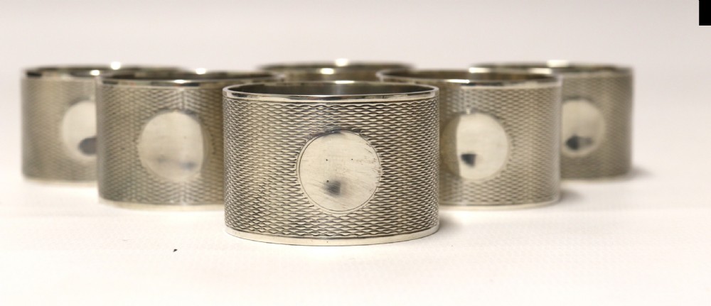 A boxed set of six Silver Napkin Rings, 1919 - 1920 View VII