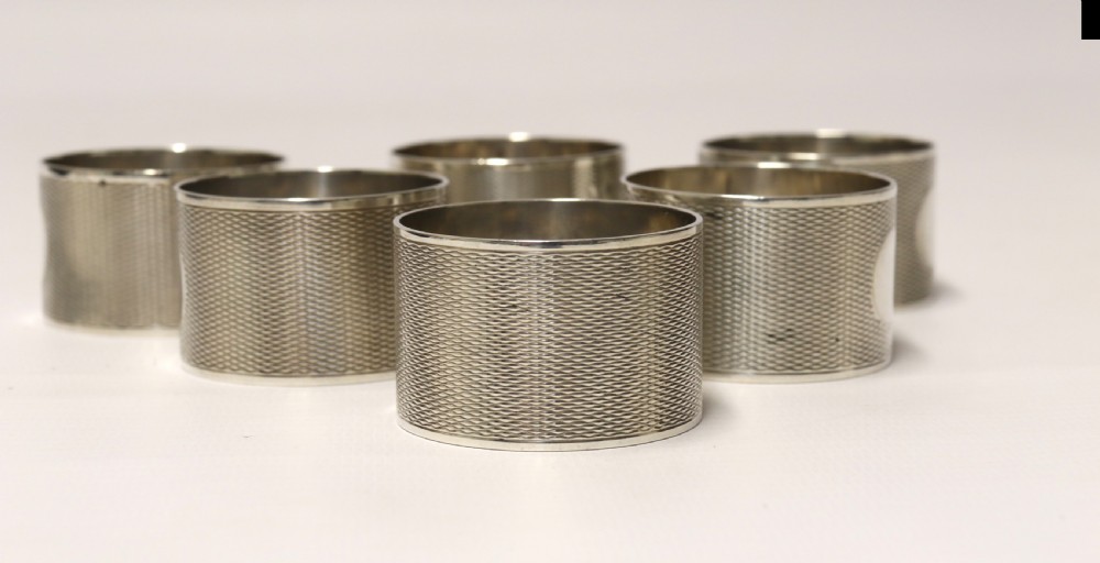 A boxed set of six Silver Napkin Rings, 1919 - 1920 View VIII